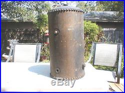 Hit and miss or throttle controlled vintage riveted cooling tank galvanized
