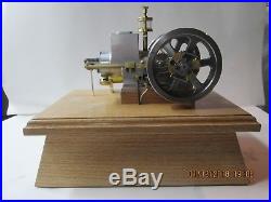 Model hit & miss engine built by retired machinist