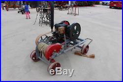 Stover Hit N Miss engine with working winch on metal cart
